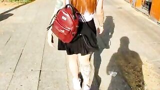 Girl does pee in her sexy shorts at public street