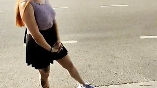 Girl does pee in her sexy shorts at public street