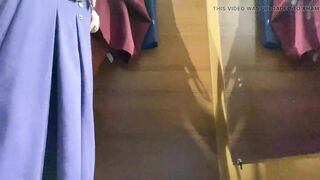 Curvy MILF in the mall fitting room trying on skirts