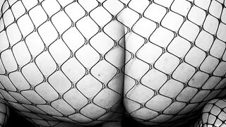 LiaKahn Spanish milf fucks her dildo dressed in a fishnet bodysuit