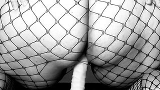 LiaKahn Spanish milf fucks her dildo dressed in a fishnet bodysuit