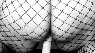 LiaKahn Spanish milf fucks her dildo dressed in a fishnet bodysuit