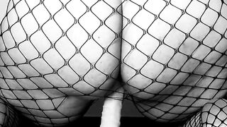 LiaKahn Spanish milf fucks her dildo dressed in a fishnet bodysuit