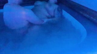 Bouncing big tits in hot tub