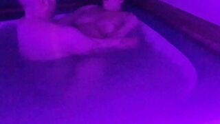 Bouncing big tits in hot tub