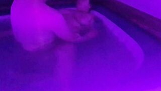 Bouncing big tits in hot tub