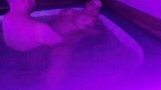 Bouncing big tits in hot tub