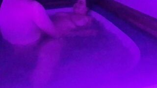 Bouncing big tits in hot tub