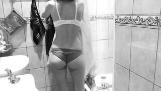 Slim MILF small tits and big booty washes and pees in the shower.