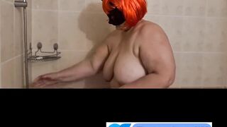 Ugly fat granny with mask takes a shower. Her saggy titts are amazing.