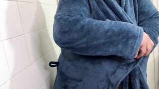 Fat granny undresses to take a shower