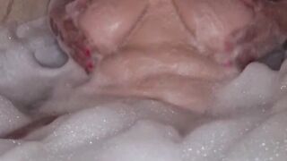 Granny BBW Lady takes a bath and shows big boobs and ass.