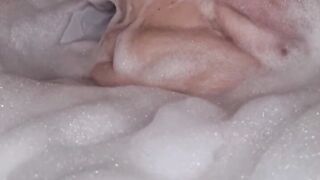 Granny BBW Lady takes a bath and shows big boobs and ass.