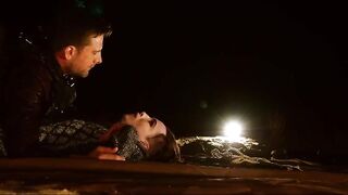 Horny bound BDSM lover in night time anal pleasure scene by the crackling fire pit for sub beauty