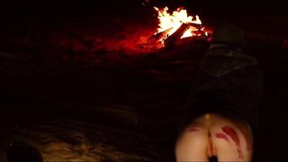 Horny bound BDSM lover in night time anal pleasure scene by the crackling fire pit for sub beauty