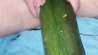 Penetration wet pussy by big cucumber