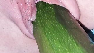 Penetration wet pussy by big cucumber