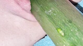 Penetration wet pussy by big cucumber