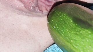 Penetration wet pussy by big cucumber