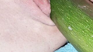 Penetration wet pussy by big cucumber