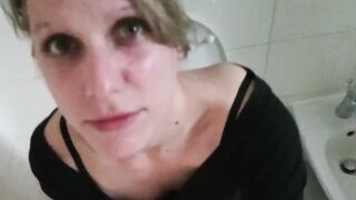 MILF sucks and deep throats BIG DICK while taking a pee in toilet