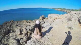 FIT GIRL HAS PASSIONATE SEX ON a PUBLIC BEACH HIDING AMONG THE ROCKS