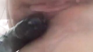 closeup black dildo in the pussy, naughty in the bathroom