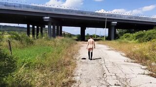 Za Za strip under the bridge with trucks