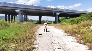 Za Za strip under the bridge with trucks