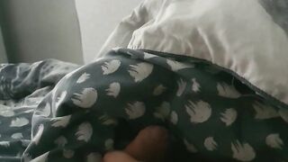 Step mom under blanket slips her hand into step son dick making him moan and cum