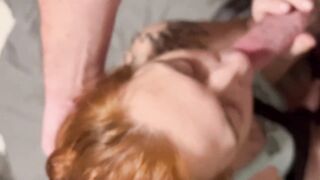 Red head gives blowjob