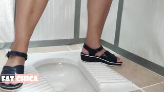 Big Ass Pissing in Panties in a Public Toilet