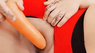 Arab Lady Trying a Carrot