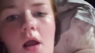 Redhead fucks herself with hairbrush