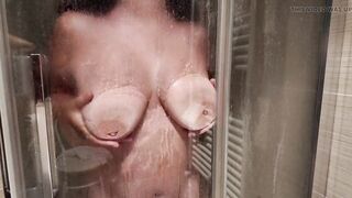 Big Breasted MILF Shaves Her Hairy Pussy in the Shower