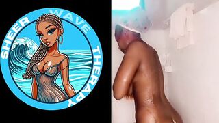 Thick African woman taking a shower