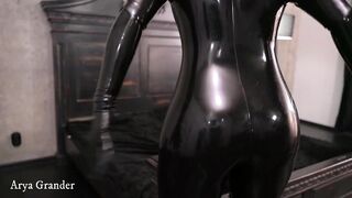 Hot Horny Woman in Black Latex Catsuit Slow Sexy Movements and Masturbaton Relaxings on the Bed