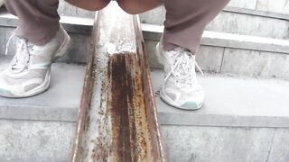 Mature Milfs Pissing on the Stairs of Public Transition