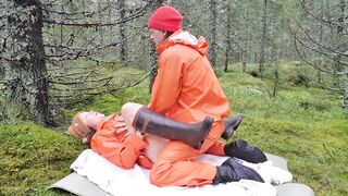 Sex in Orange Rainwear in the Woods