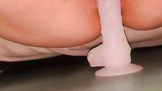 Hairy pussy squirts while fucking dildo with windows open