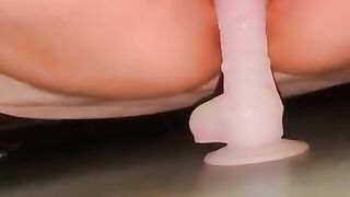 Hairy pussy squirts while fucking dildo with windows open