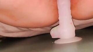 Hairy pussy squirts while fucking dildo with windows open