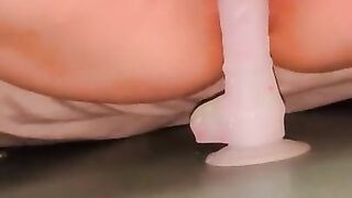 Hairy pussy squirts while fucking dildo with windows open