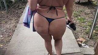 Milk walking in public wearing a thong