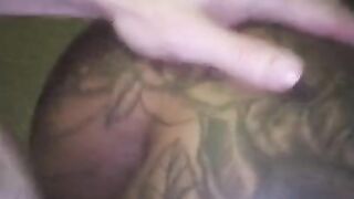 Doggy style. ebony tattooed woman getting fucked