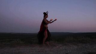 Candels Dance against the background of the night sky