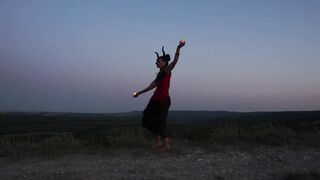 Candels Dance against the background of the night sky