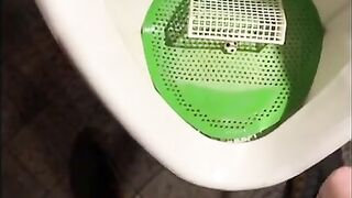 Pissing into a urinal in a pub. I play football with urine