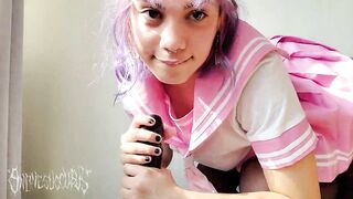 student with pink hair rubs her ass on a black dick and does oral