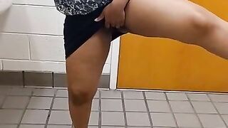 Rubbing my pussy in a public restroom